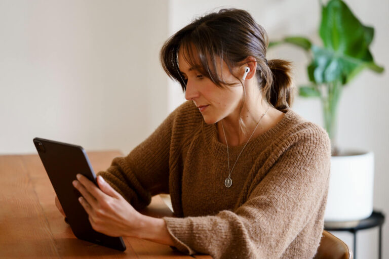 women viewing tablet