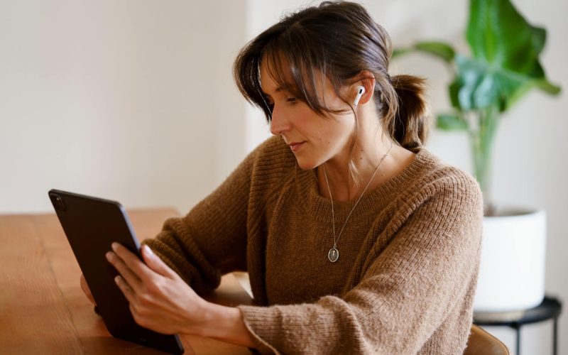 women viewing tablet